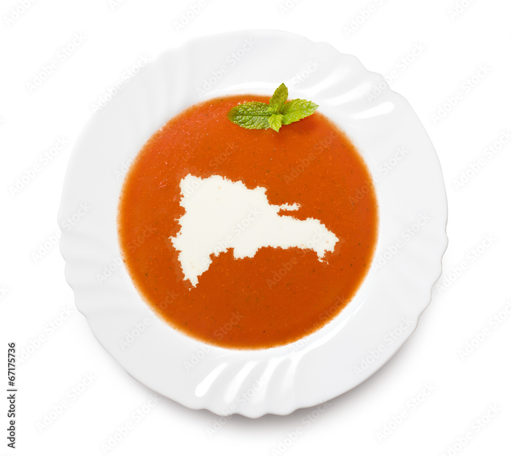 Plate tomato soup with cream in the shape of Dominican Republic. Plate tomato soup with cream in the shape of Dominican Republic.