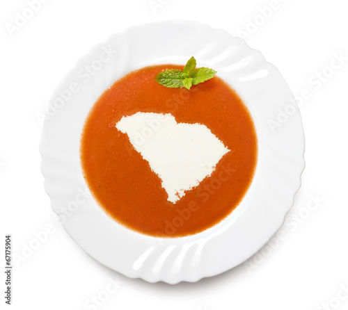 Plate tomato soup with cream in the shape of South Carolina.(ser