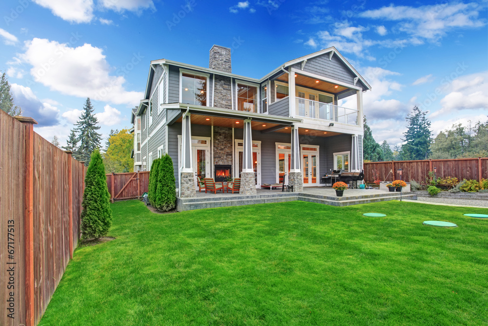 Fototapeta premium Luxury house exterior. Backyard view