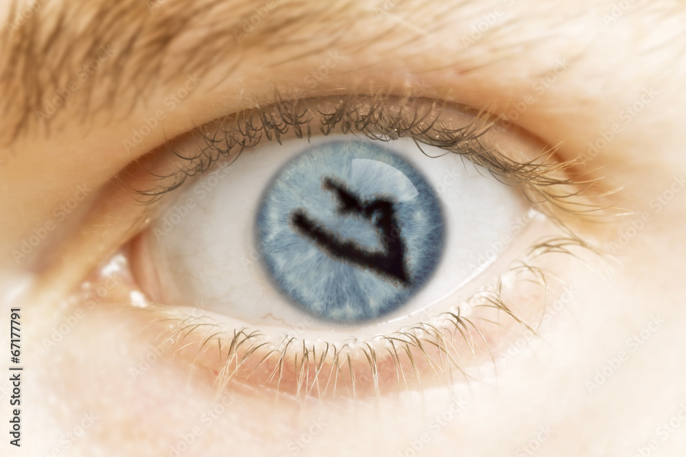 Close-up of an eye with the pupil in the shape of Wake Island.(s Close-up of an eye with the pupil in the shape of Wake Island.(s