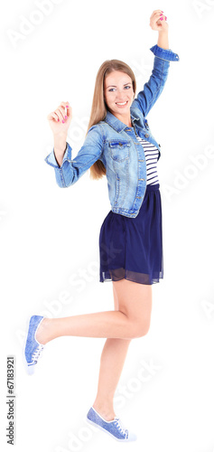 Beautiful young girl in skirt, jacket and t-shirt isolated