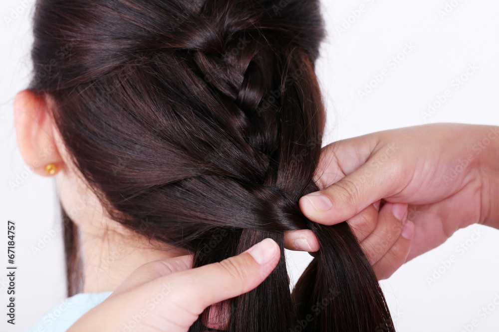 Fototapeta premium Creating hairstyles hairdresser close-up