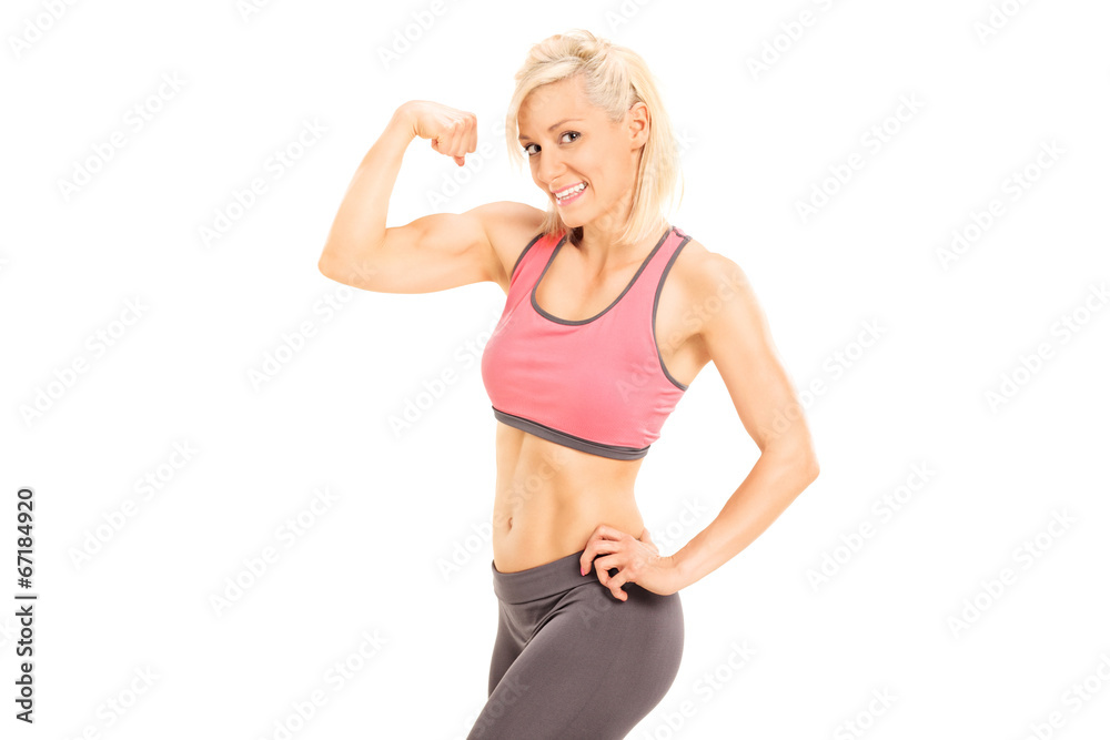 Female bodybuilder showing bicep Female bodybuilder showing bicep