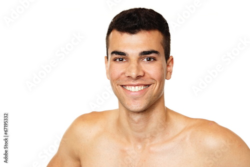 Portrait of young smiling man shirtless