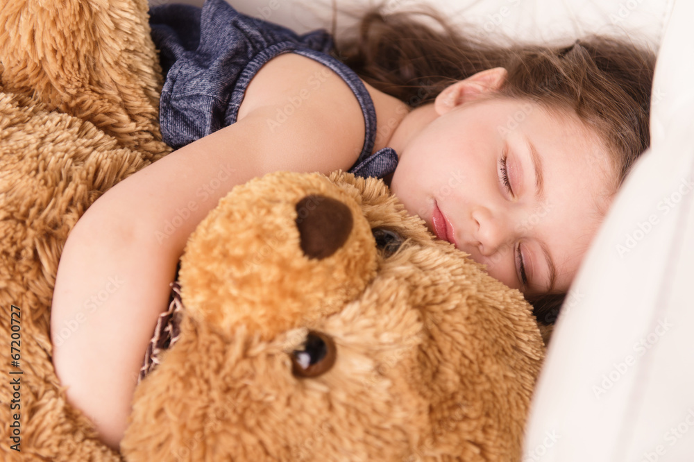 little girl hugging teddy bear. little girl hugging teddy bear.