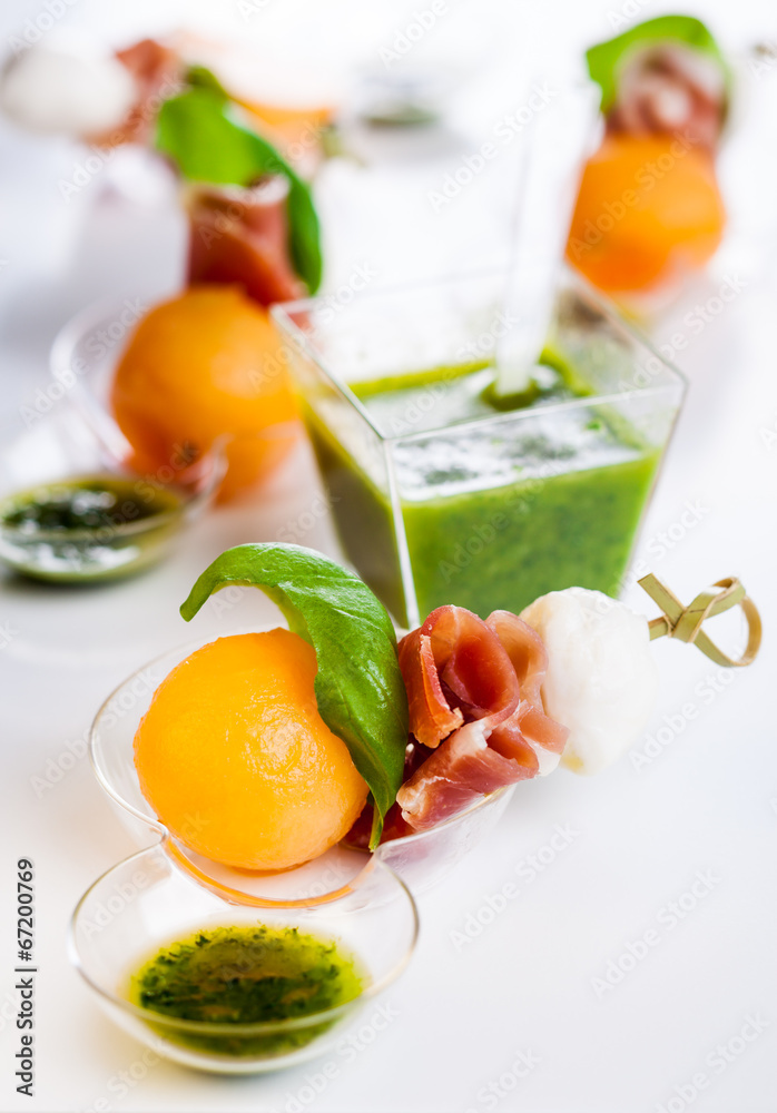 melon,mozzarella and prosciutto on skewers melon,mozzarella and prosciutto on skewers