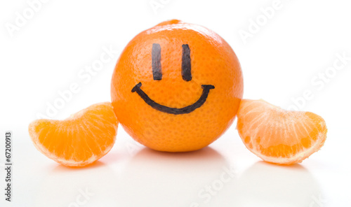 Smiling orange mandarin or tangerine fruit