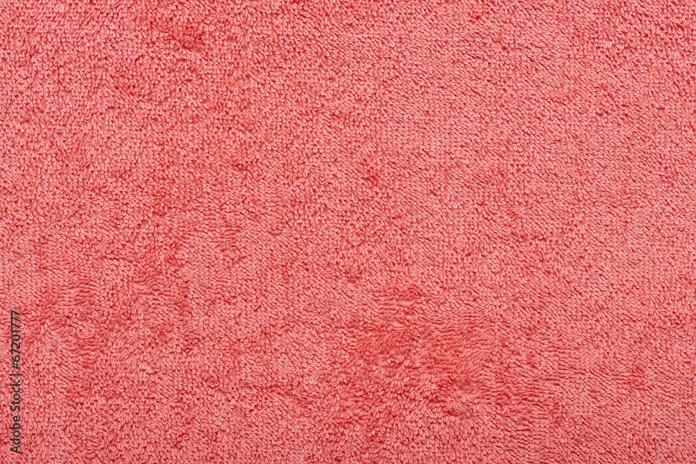 Fototapeta premium The terry red towel as a background