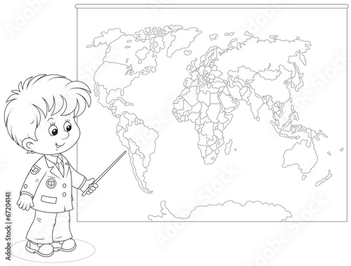 Schoolboy at a World map