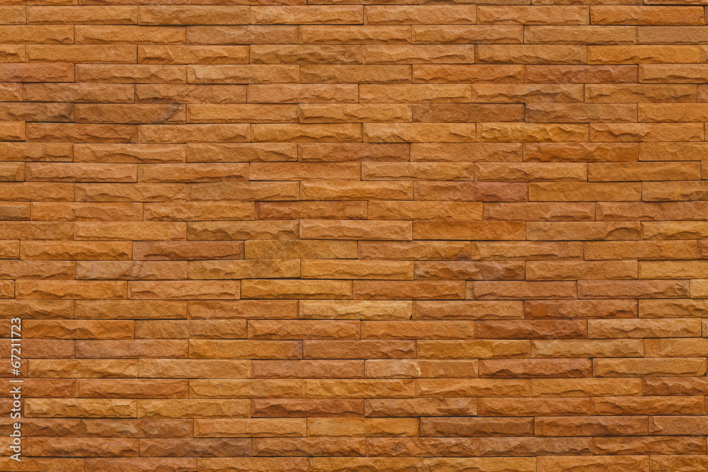Orange slate stone wall for pattern and background Orange slate stone wall for pattern and background