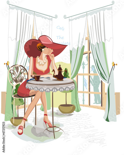 Girl drinking coffee inside cafe