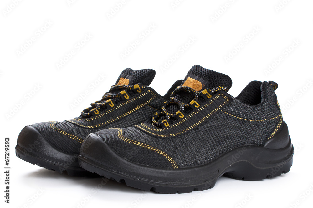 Black working boots with yellow thread on white Black working boots with yellow thread on white