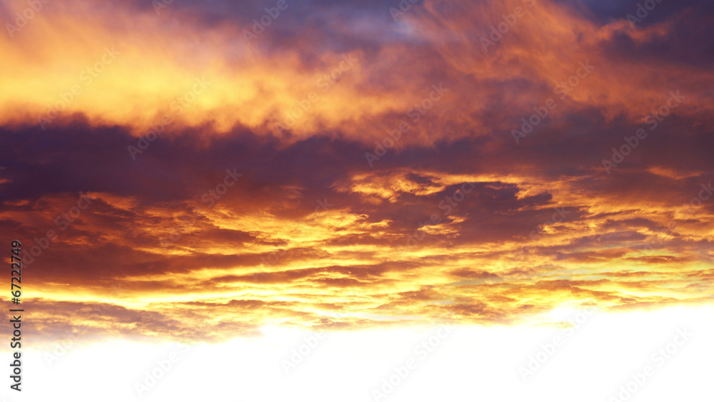 Fototapeta premium Hot warm sunlit sunset sunrise sky