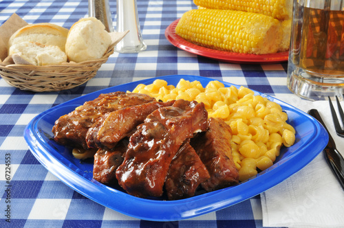 Barbecued ribs with macaroni and cheese photo