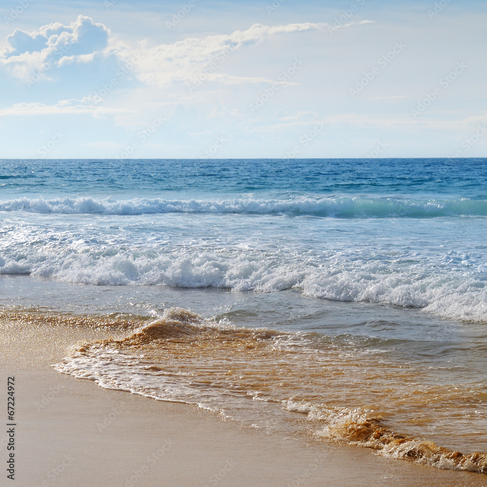 seascape, sand beach and blue sky seascape, sand beach and blue sky