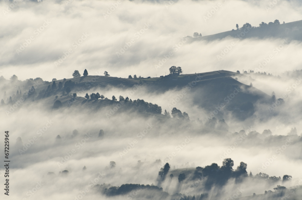 Morning clouds over mountains