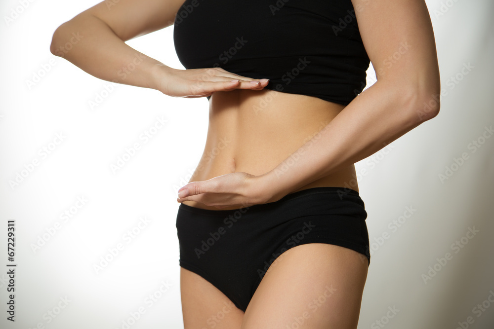 Fototapeta premium Hand on the tummy