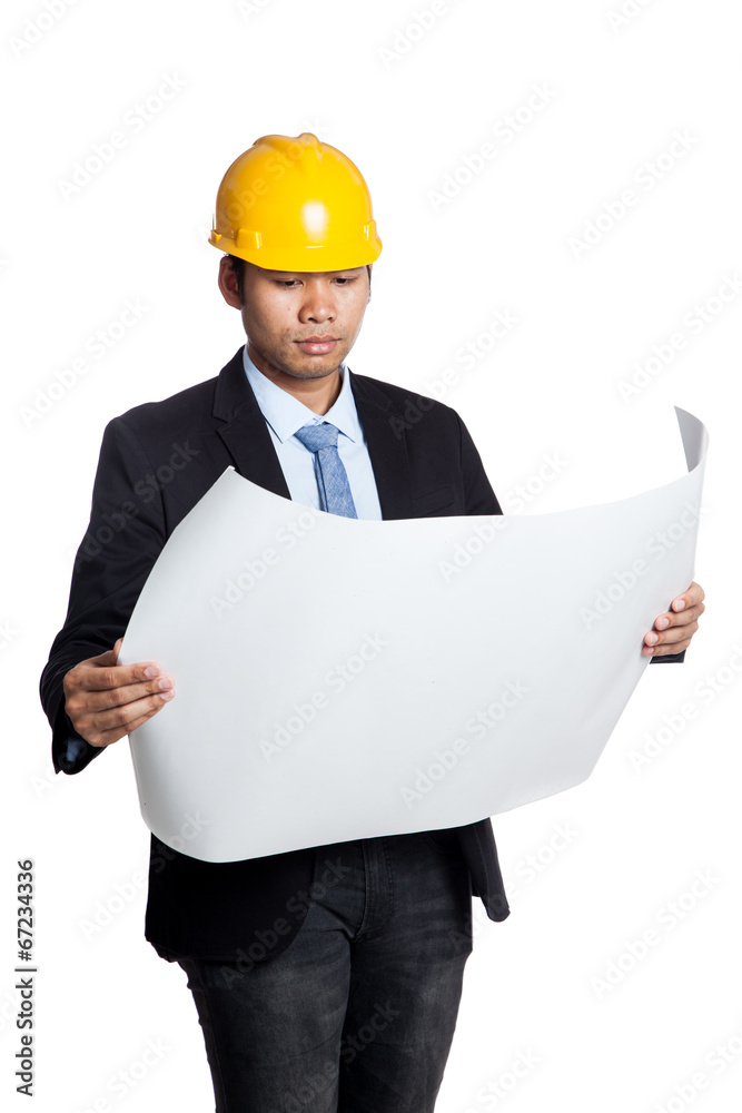 Asian engineer man reading a blueprint Asian engineer man reading a blueprint