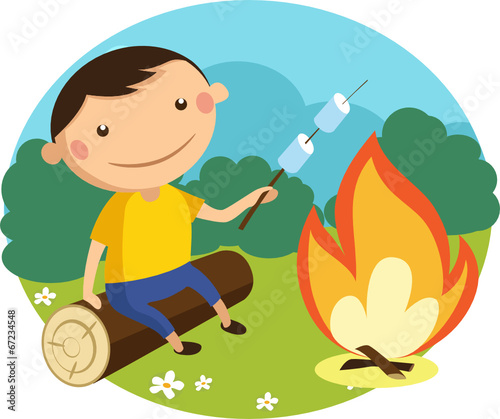 boy roasts marshmallows