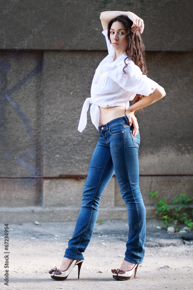 woman in jeans posing
