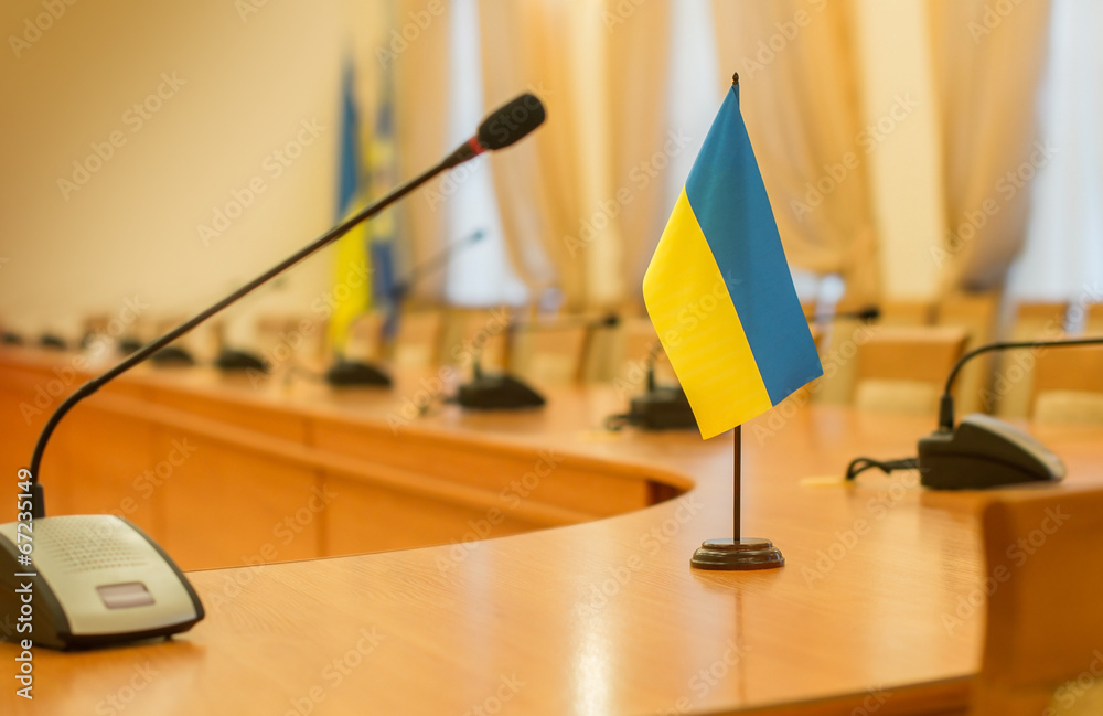 Flag of Ukraine on the negotiating table