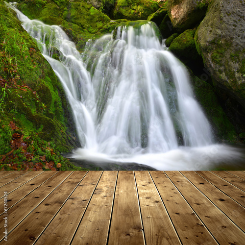 Waterfall with wooden planks