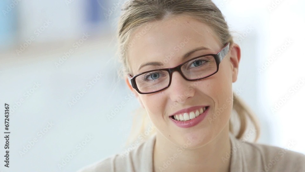 Beautiful smiling woman with eyeglasses on Beautiful smiling woman with eyeglasses on