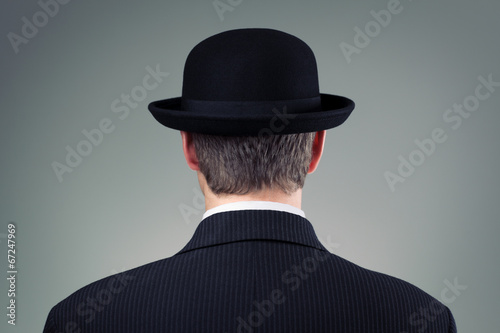 Businessman in bowler hat