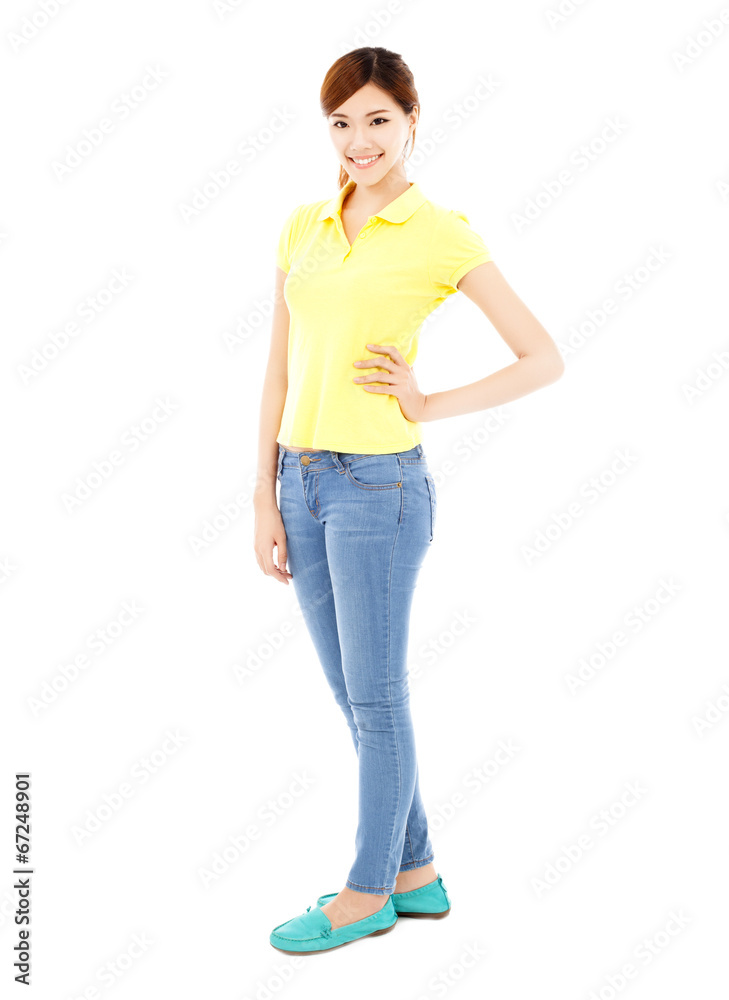 smiling asian young woman standing and hand on waist