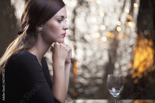 Lonely unhappy woman waiting for date