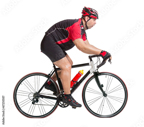 Fototapeta Naklejka Na Ścianę i Meble -  obese cyclist with difficulty riding a bicycle