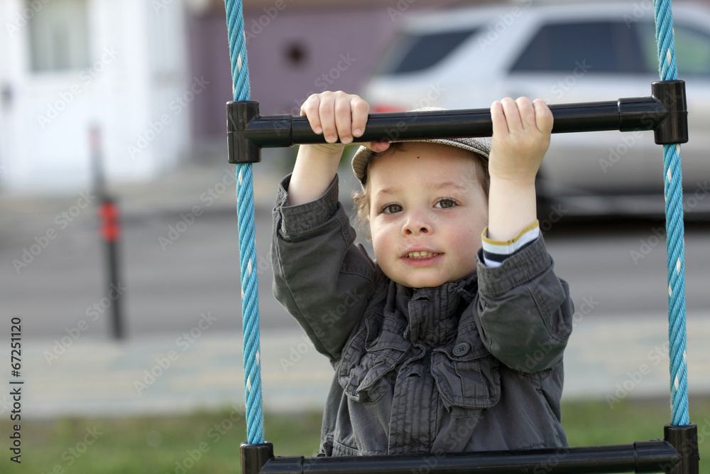 Boy on a rope ladder Boy on a rope ladder