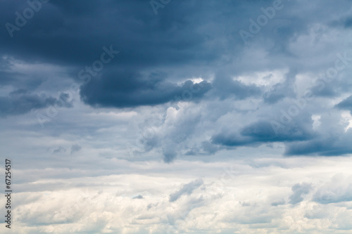 grey blue rainy clouds in overcast sky