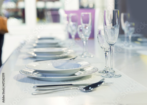 Served fashion table in white colors