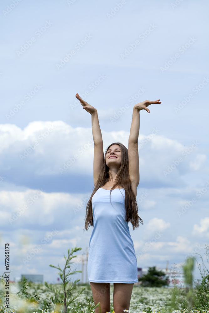 Young beautiful woman in sexy blue dress Young beautiful woman in sexy blue dress