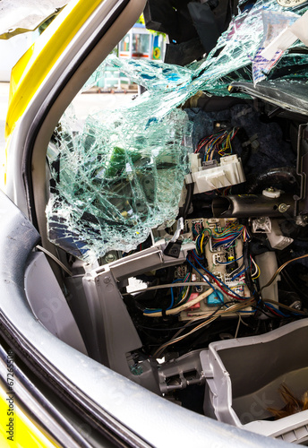 Fototapeta Naklejka Na Ścianę i Meble -  Inside of the yellow car accident which demolished broken glass