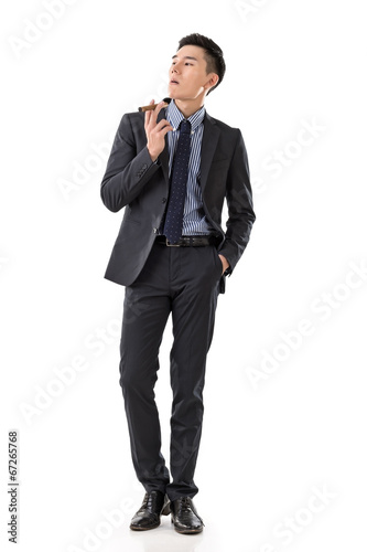 businessman holding a cigar