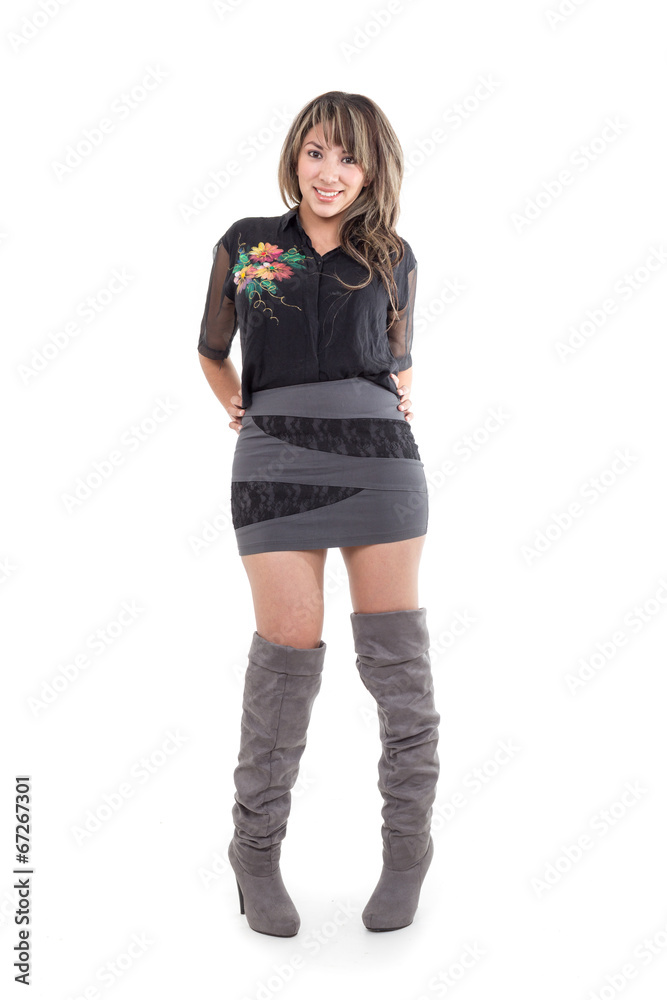 pretty girl wearing mini dress posing with hands on her hips pretty girl wearing mini dress posing with hands on her hips