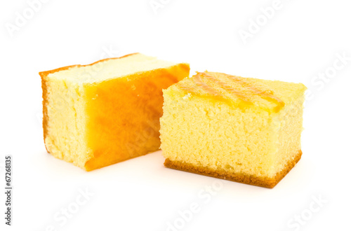 Canvas Print two pieces of sponge cakes on a white background