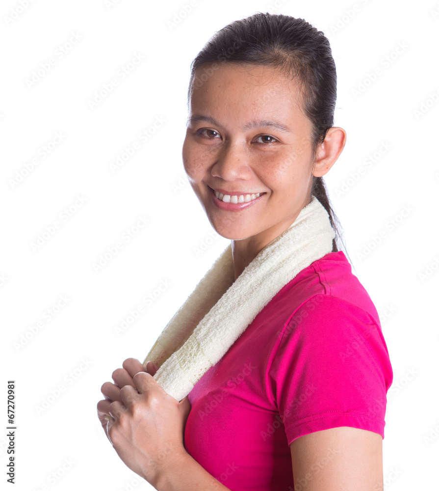 Female Asian in sports attire with a towel over white background