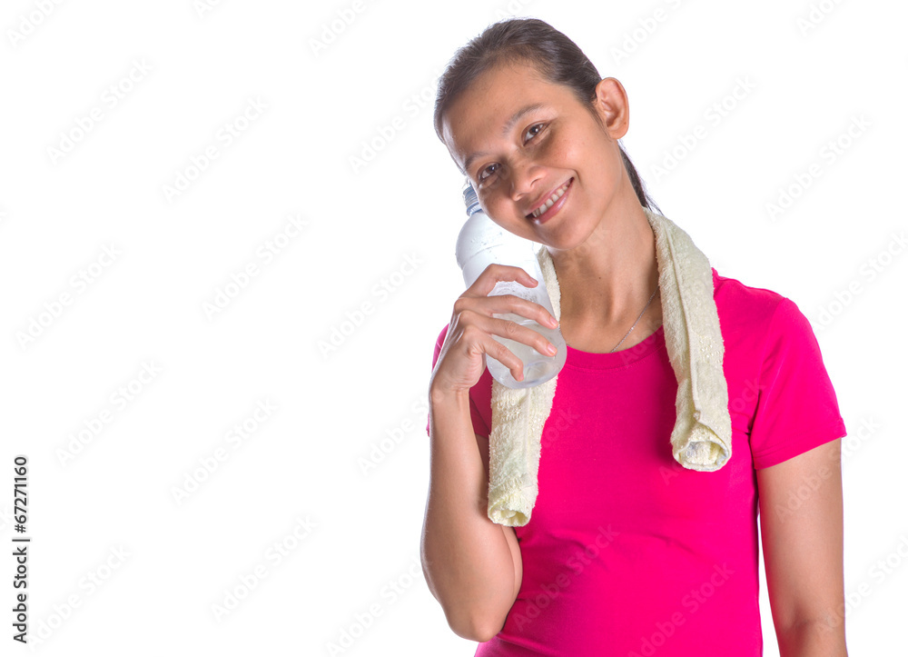 Female Asian in sports attire with a bottle of mineral water Female Asian in sports attire with a bottle of mineral water