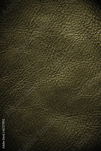 Brown textured leather grunge background closeup