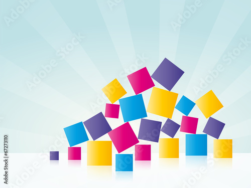 colored cubes stacked in a pile