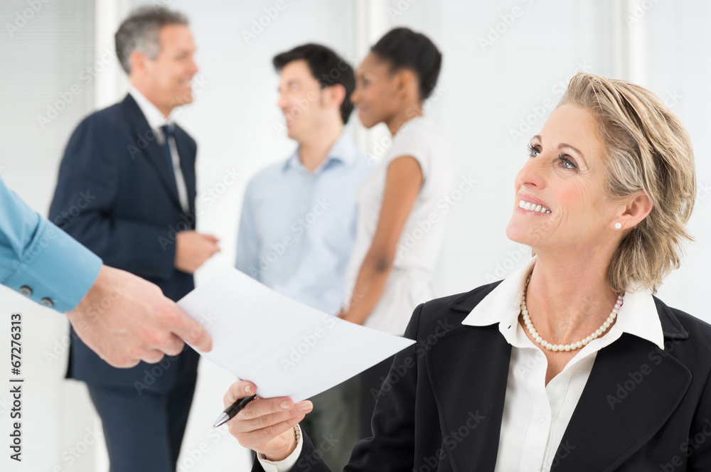 Happy Businesswoman Holding Document Happy Businesswoman Holding Document