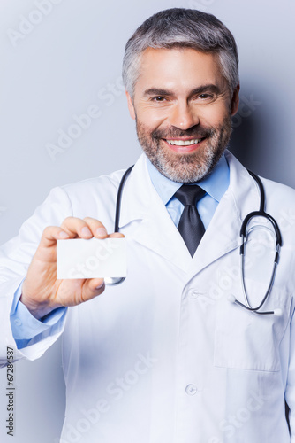 Doctor with business card.