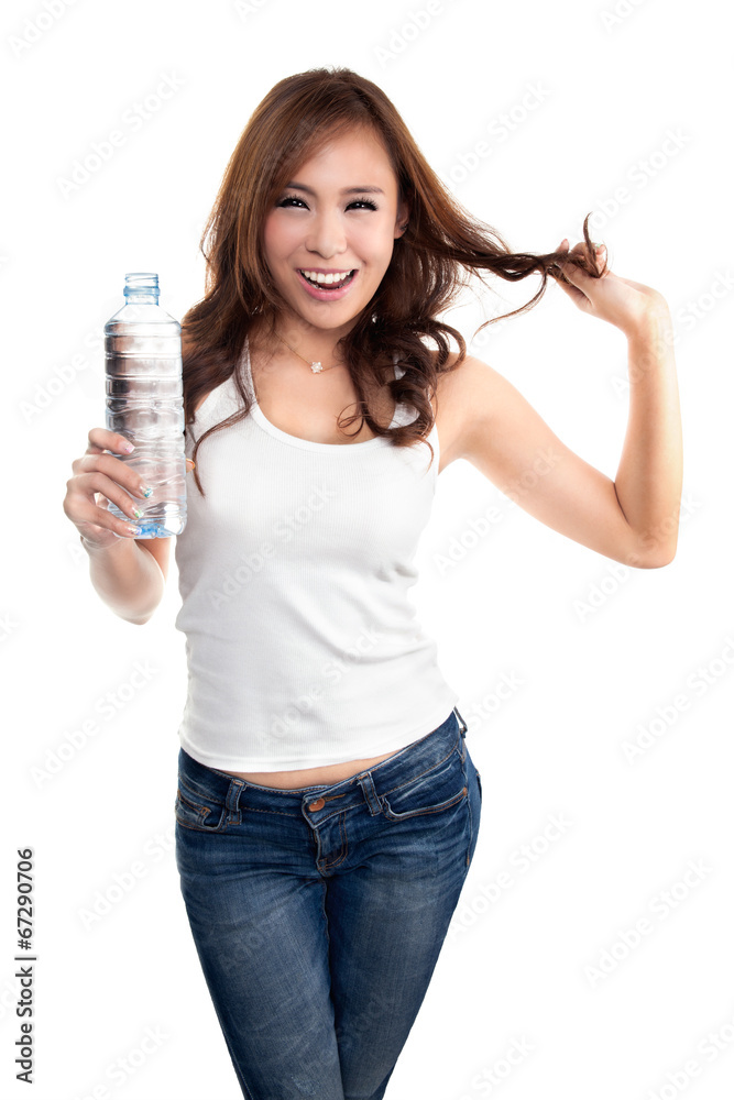 Young beautiful woman holding bottle of water. Young beautiful woman holding bottle of water.