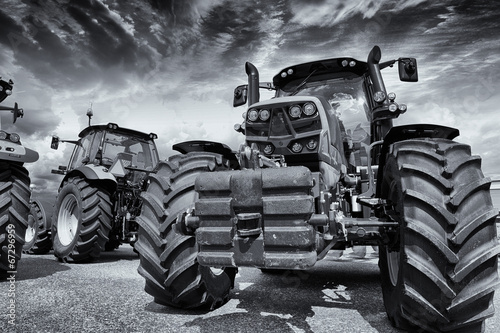Canvas Print giant farming tractors and tires