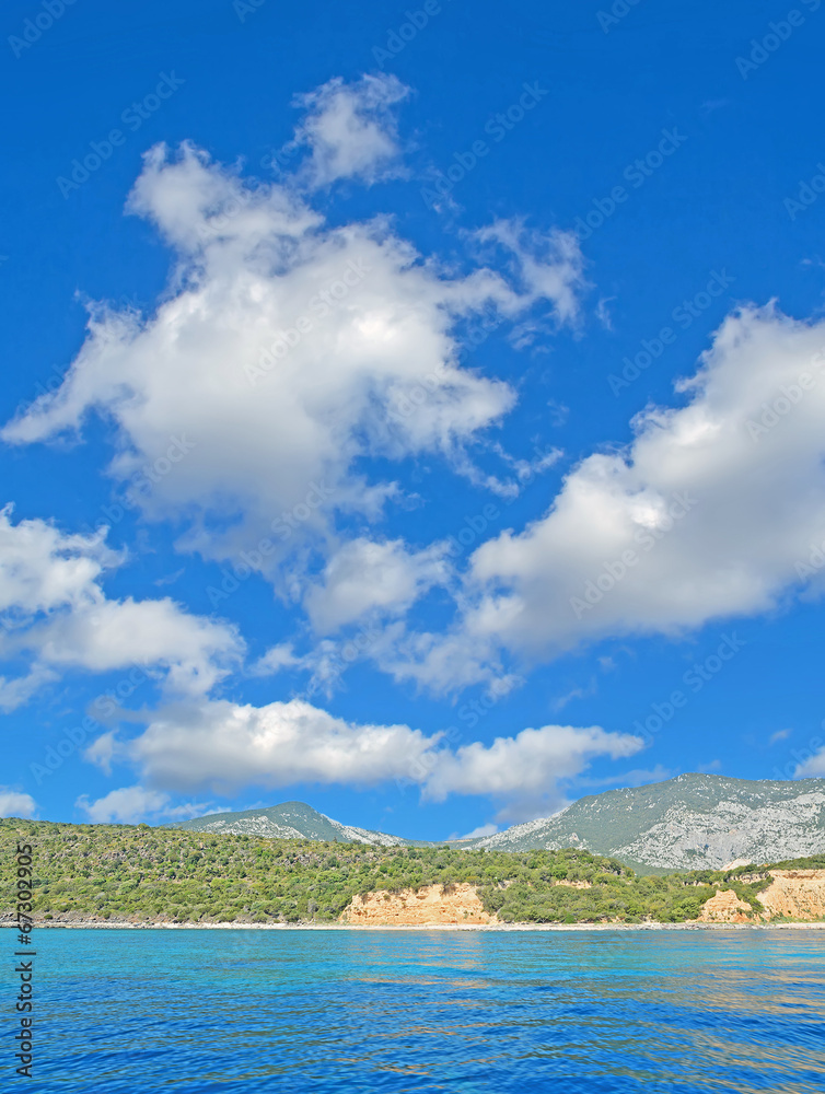 clouds over Cala Gonone shore