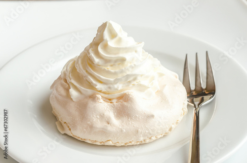 Meringue cake with whipped cream