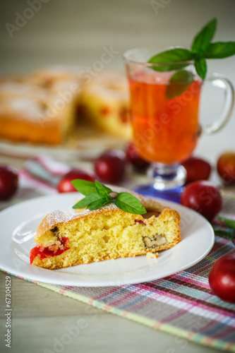 Biscuit cake with cherry plums